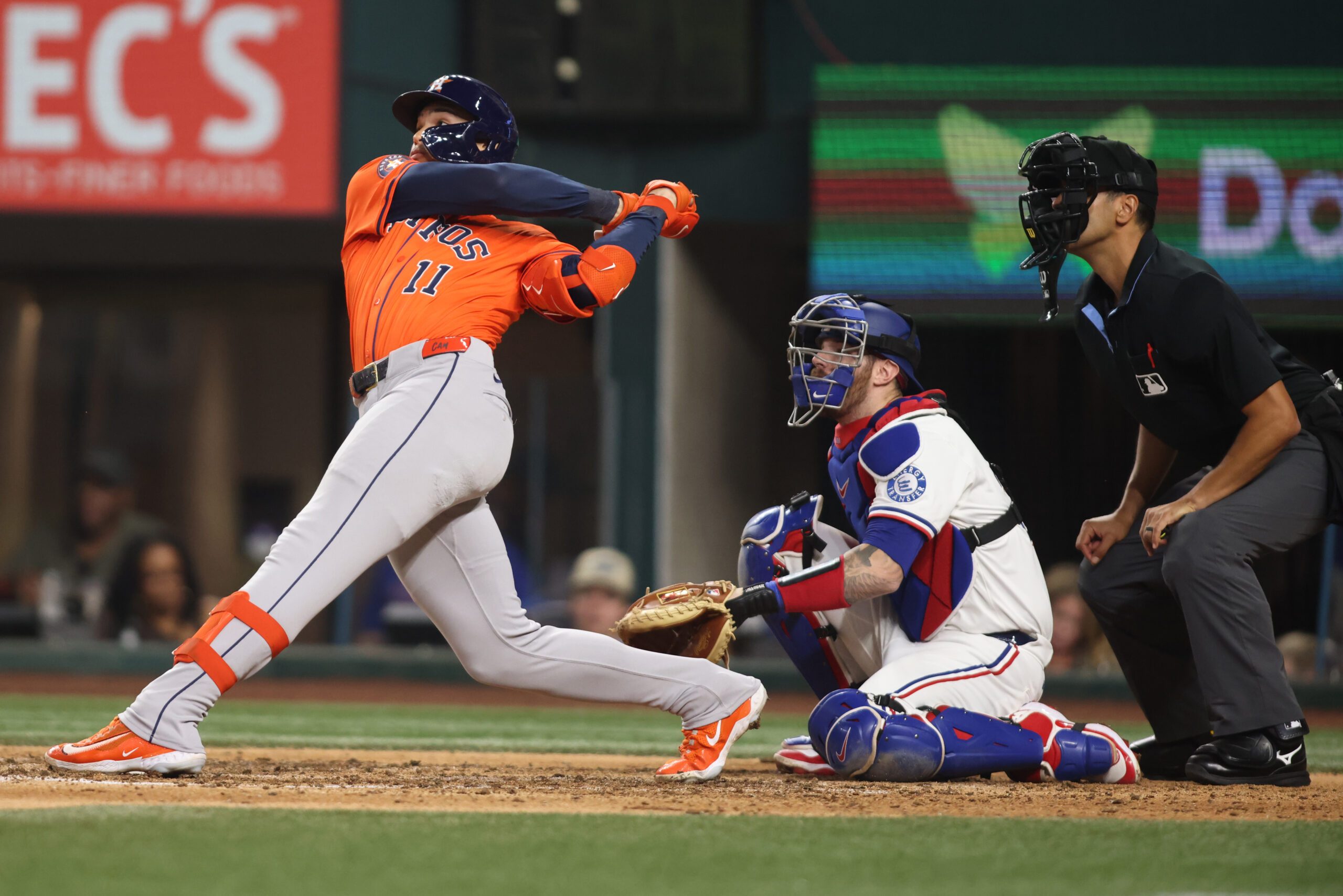 Sep 6, 2025; Arlington, Texas, USA; Houston Astros pinch hitter Cam Smith (11) hits a triple during the eighth inning against the Texas Rangers at Globe Life Field. Mandatory Credit: Tim Heitman-Imagn Images