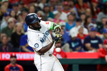 Sep 8, 2025; Seattle, Washington, USA; Seattle Mariners left fielder Randy Arozarena (56) hits a single against the St. Louis Cardinals during the sixth inning at T-Mobile Park. Mandatory Credit: Joe Nicholson-Imagn Images