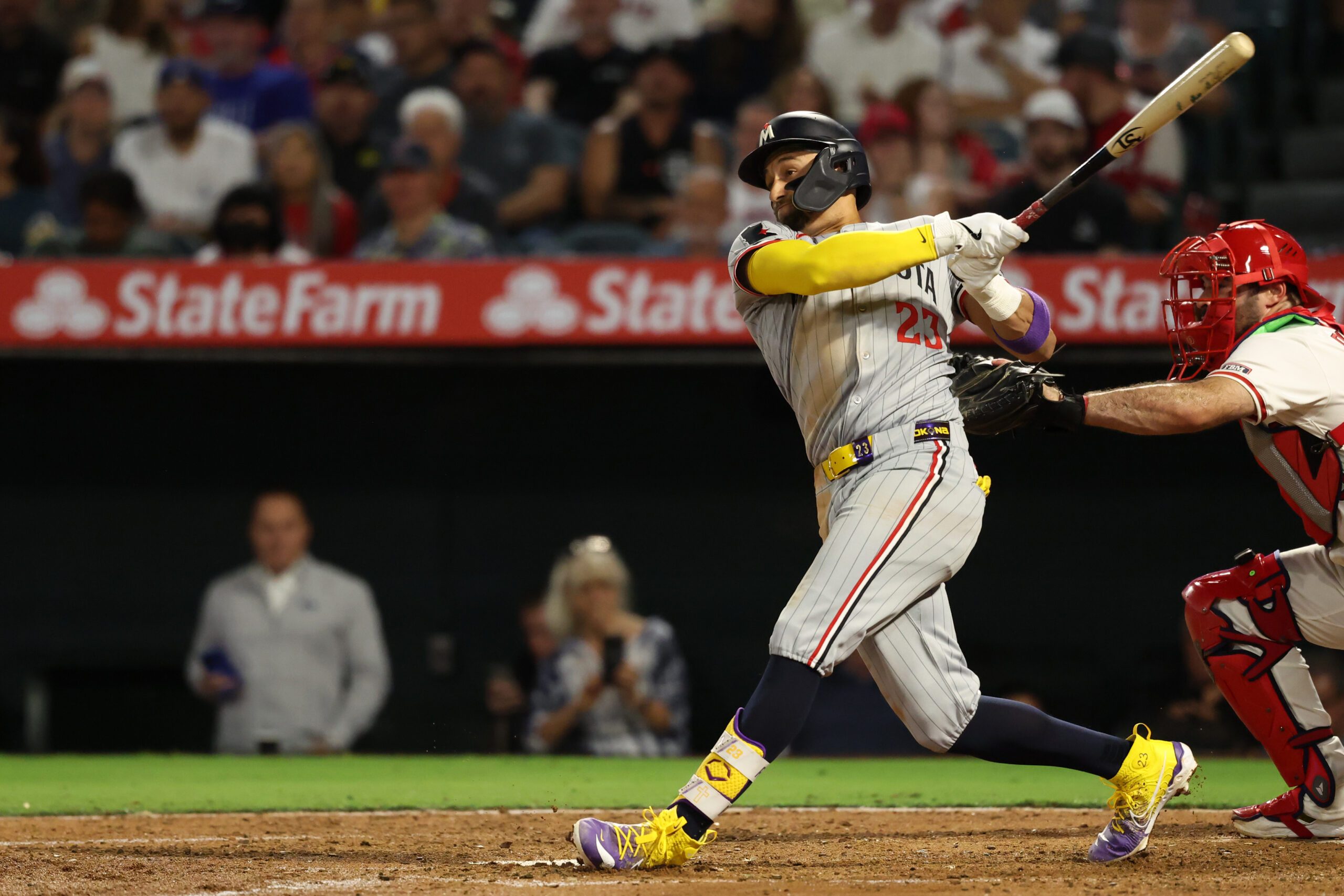 Sep 8, 2025; Anaheim, California, USA;  Minnesota Twins third baseman Royce Lewis (23) hits a two-run home run during the fifth inning against the Los Angeles Angels at Angel Stadium. Mandatory Credit: Kiyoshi Mio-Imagn Images