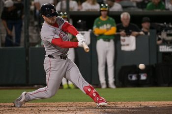 Sep 8, 2025; West Sacramento, California, USA; Boston Red Sox third baseman Alex Bregman (2) hits an rbi single against the Athletics during the fifth inning at Sutter Health Park. Mandatory Credit: Ed Szczepanski-Imagn Images