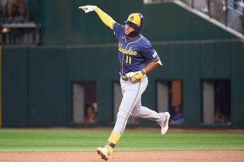 Sep 10, 2025; Arlington, Texas, USA; Milwaukee Brewers left fielder Jackson Chourio (11) rounds the bases after hitting a solo home run against the Texas Rangers during the first inning at Globe Life Field. Mandatory Credit: Jim Cowsert-Imagn Images