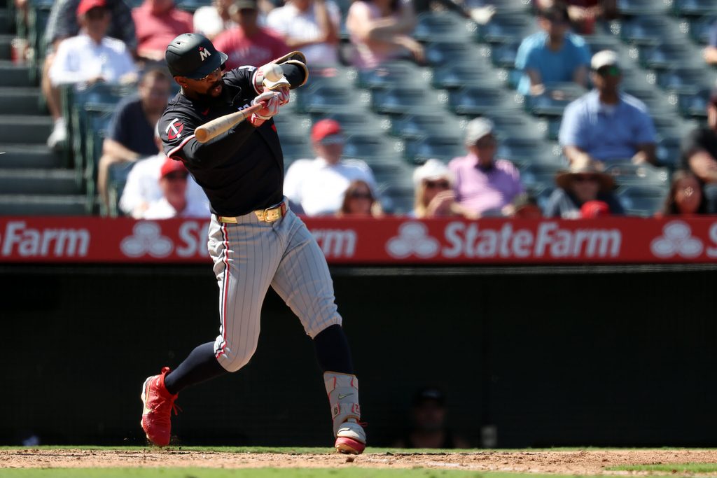 Sep 10, 2025; Anaheim, California, USA; Minnesota Twins designated hitter Byron Buxton (25) hits a two-run home run during the sixth inning against the Los Angeles Angels at Angel Stadium. Mandatory Credit: Kiyoshi Mio-Imagn Images
