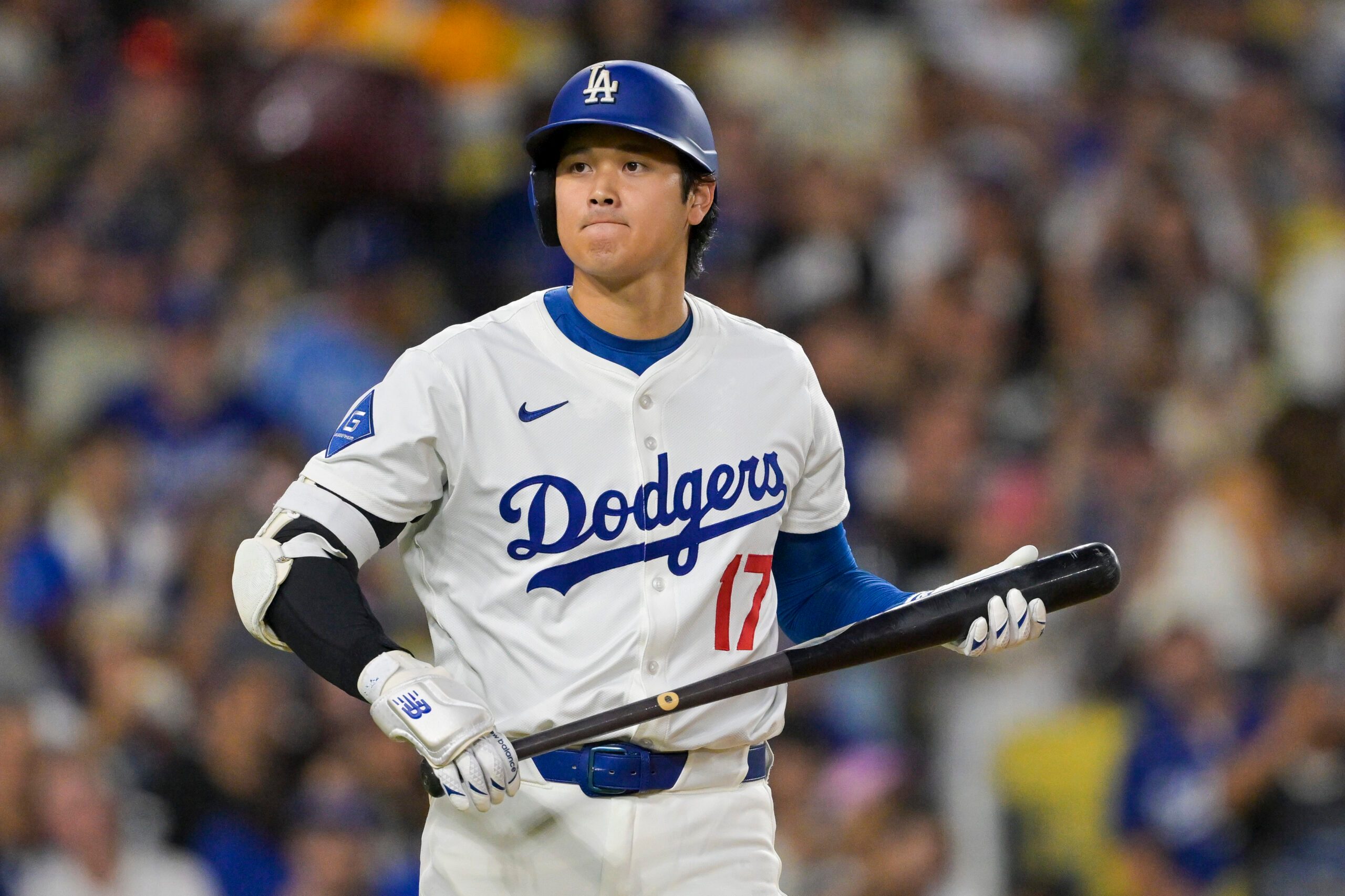 Sep 10, 2025; Los Angeles, California, USA; Los Angeles Dodgers designated hitter Shohei Ohtani (17) looks on during the first inning against the Colorado Rockies at Dodger Stadium. Mandatory Credit: Jayne Kamin-Oncea-Imagn Images