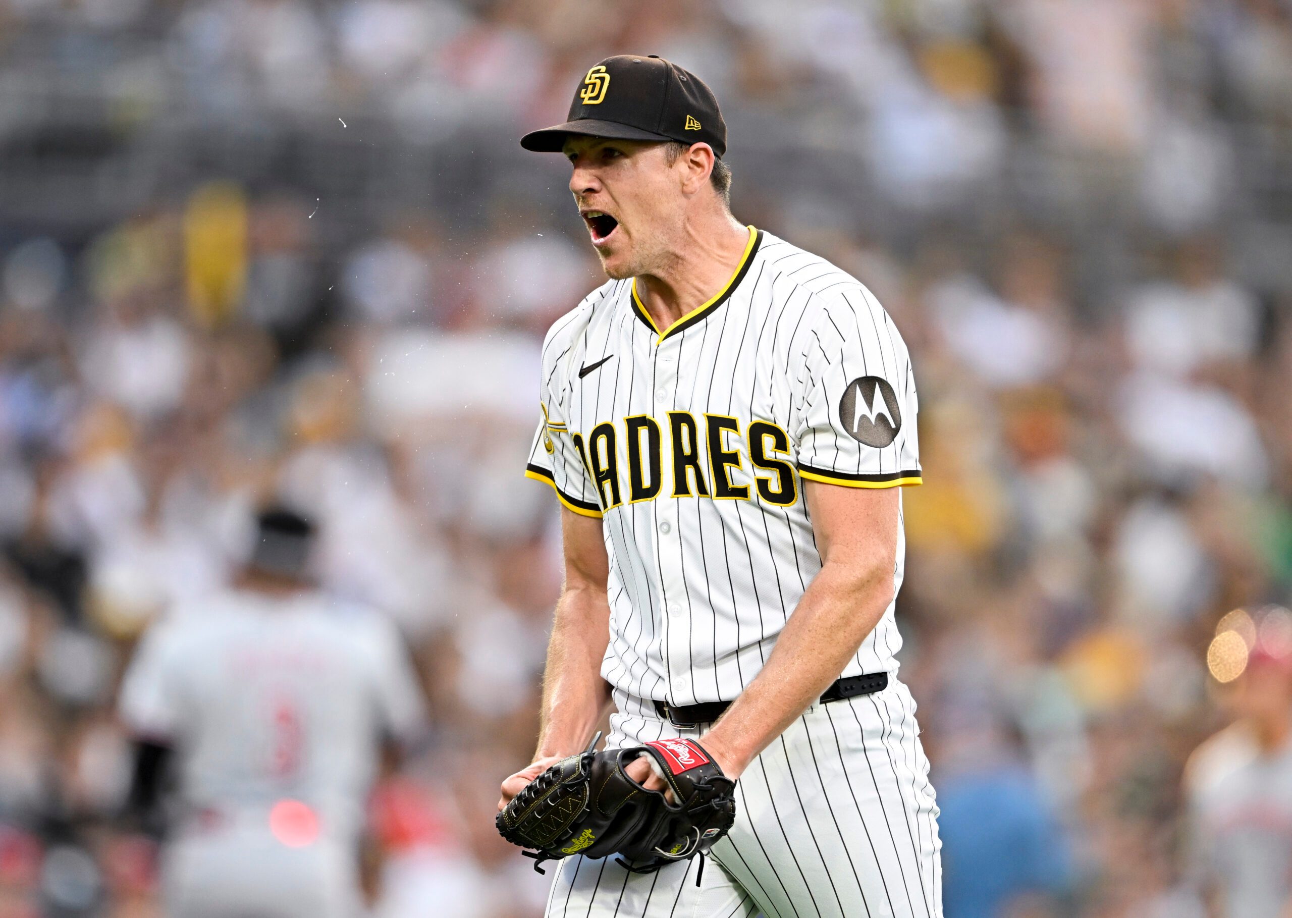 Sep 10, 2025; San Diego, California, USA; San Diego Padres starting pitcher Nick Pivetta (27) reacts after a strike out during the third inning against the Cincinnati Reds at Petco Park. Mandatory Credit: Denis Poroy-Imagn Images