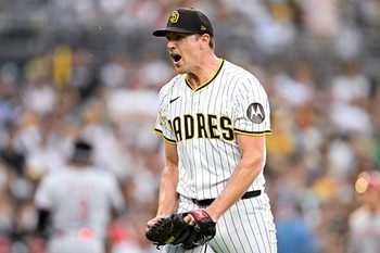 Sep 10, 2025; San Diego, California, USA; San Diego Padres starting pitcher Nick Pivetta (27) reacts after a strike out during the third inning against the Cincinnati Reds at Petco Park. Mandatory Credit: Denis Poroy-Imagn Images