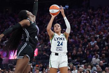 Sep 6, 2025; San Francisco, California, USA;  Minnesota Lynx forward Napheesa Collier (24) shoots over Golden State Valkyries center Temi Fagbenle (14) in the second quarter at Chase Center. Mandatory Credit: David Gonzales-Imagn Images