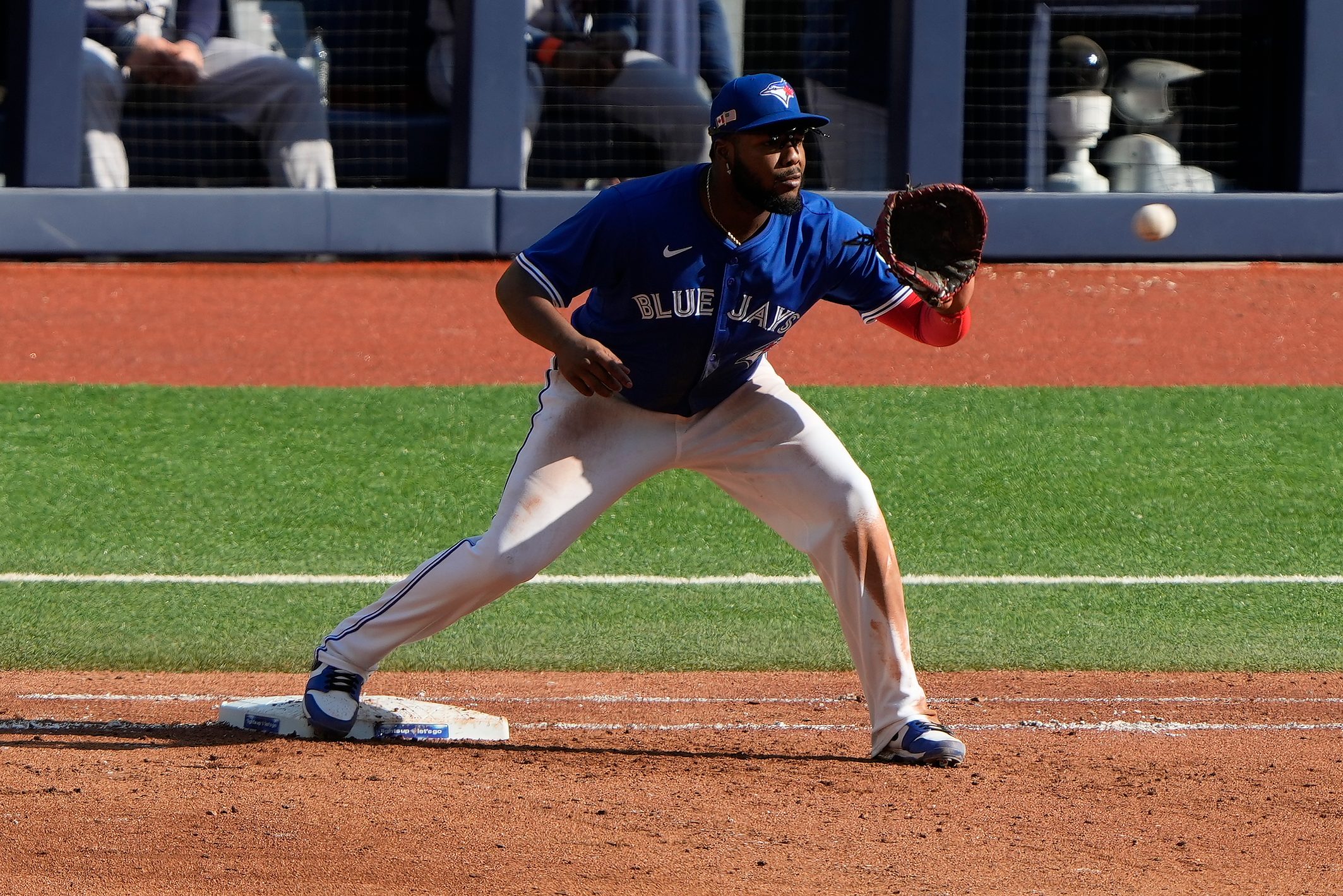Sep 11, 2025; Toronto, Ontario, CAN; Toronto Blue Jays first baseman Vladimir Guerrero Jr. (27) gets Houston Astros center fielder Mauricio Dubon (not pictured) out at first base during the sixth inning at Rogers Centre. Mandatory Credit: John E. Sokolowski-Imagn Images