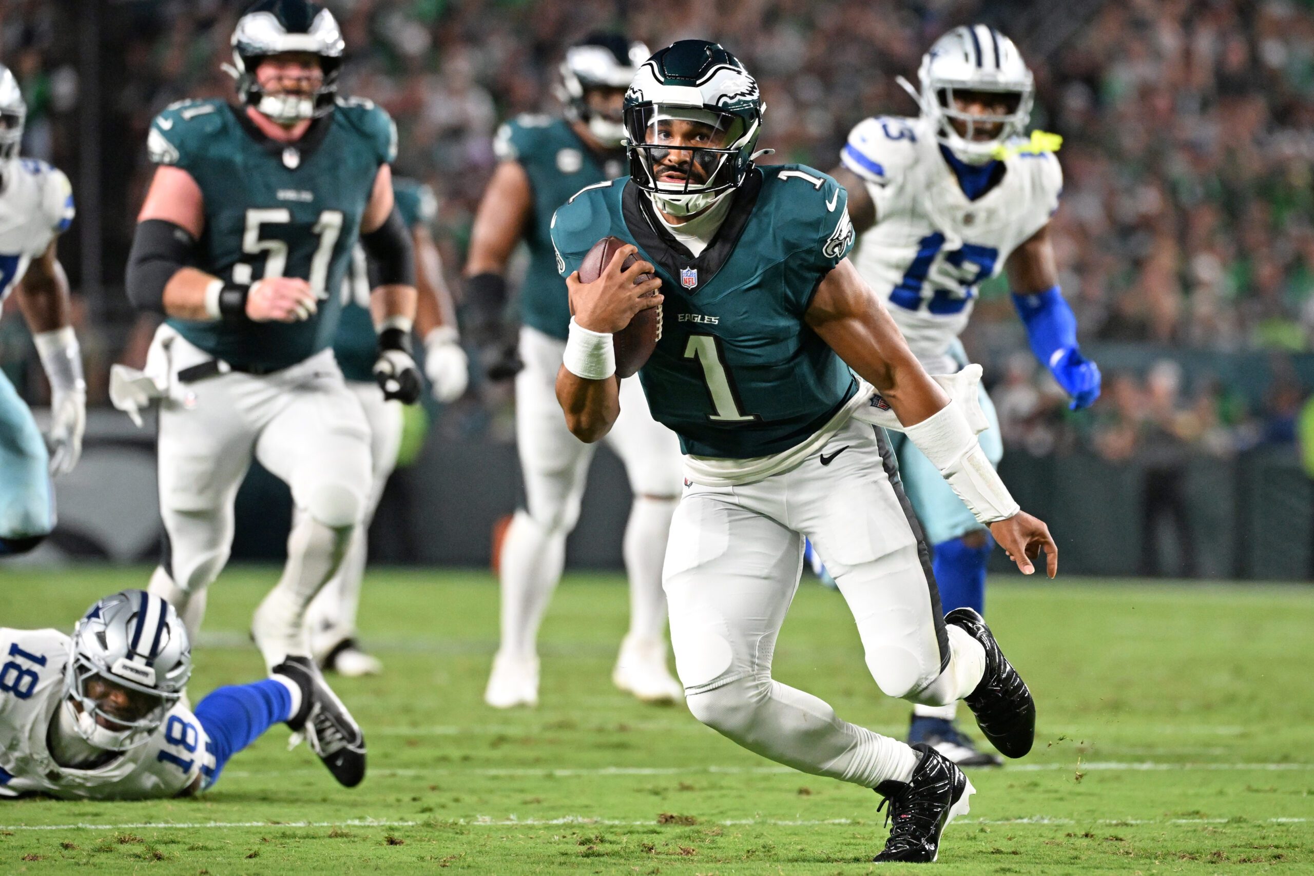 Sep 4, 2025; Philadelphia, Pennsylvania, USA; Philadelphia Eagles quarterback Jalen Hurts (1) against the Dallas Cowboys at Lincoln Financial Field. Mandatory Credit: Eric Hartline-Imagn Images