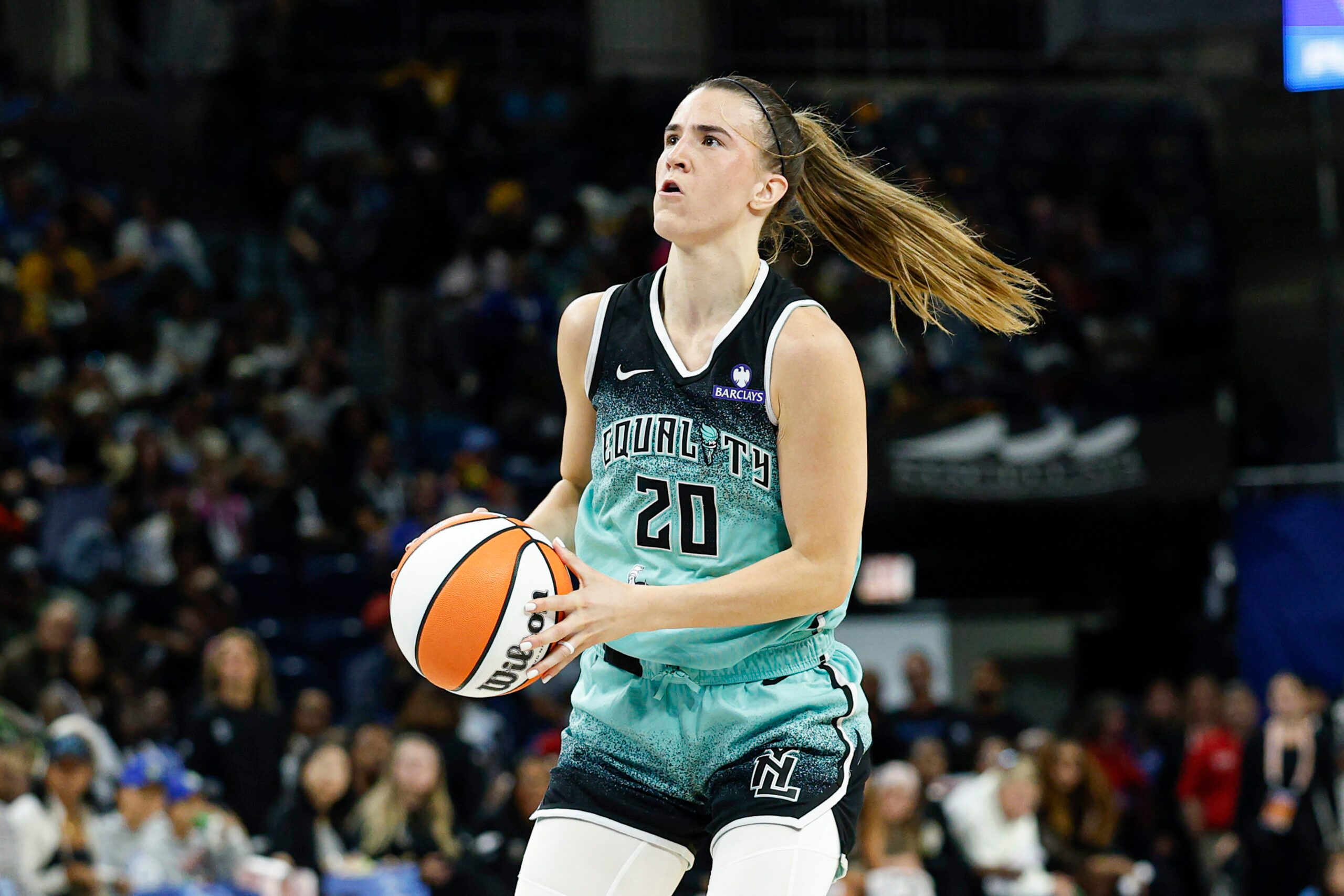 Sep 11, 2025; Chicago, Illinois, USA; New York Liberty guard Sabrina Ionescu (20) looks to shoot against the Chicago Sky during the first half at Wintrust Arena. Mandatory Credit: Kamil Krzaczynski-Imagn Images