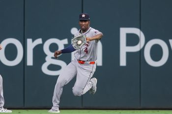 Sep 12, 2025; Atlanta, Georgia, USA; Houston Astros right fielder Jesus Sanchez (4) fields a ball against the Atlanta Braves in the eighth inning at Truist Park. Mandatory Credit: Brett Davis-Imagn Images