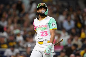 Sep 12, 2025; San Diego, California, USA; San Diego Padres right fielder Fernando Tatis Jr. (23) blows a bubble after striking out during the eighth inning against the Colorado Rockies at Petco Park. Mandatory Credit: Denis Poroy-Imagn Images