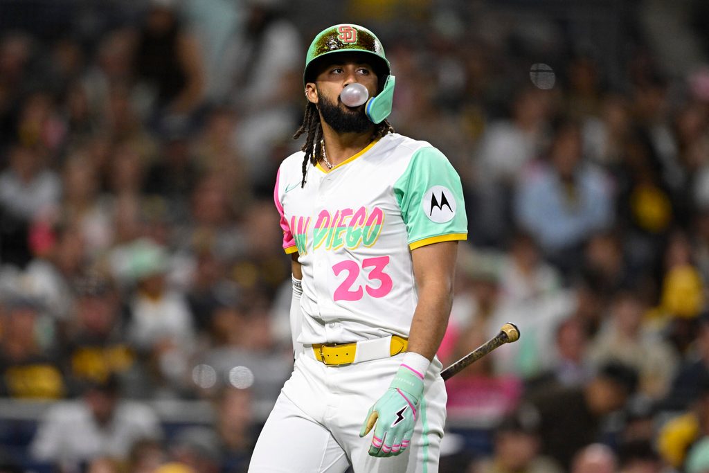 Sep 12, 2025; San Diego, California, USA; San Diego Padres right fielder Fernando Tatis Jr. (23) blows a bubble after striking out during the eighth inning against the Colorado Rockies at Petco Park. Mandatory Credit: Denis Poroy-Imagn Images
