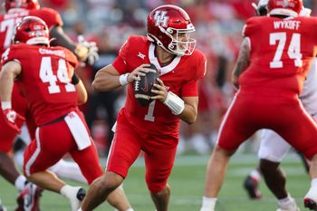 Sep 12, 2025; Houston, Texas, USA; Houston Cougars quarterback Conner Weigman (1) runs with the ball during the first quarter against the Colorado Buffaloes at TDECU Stadium. Mandatory Credit: Troy Taormina-Imagn Images