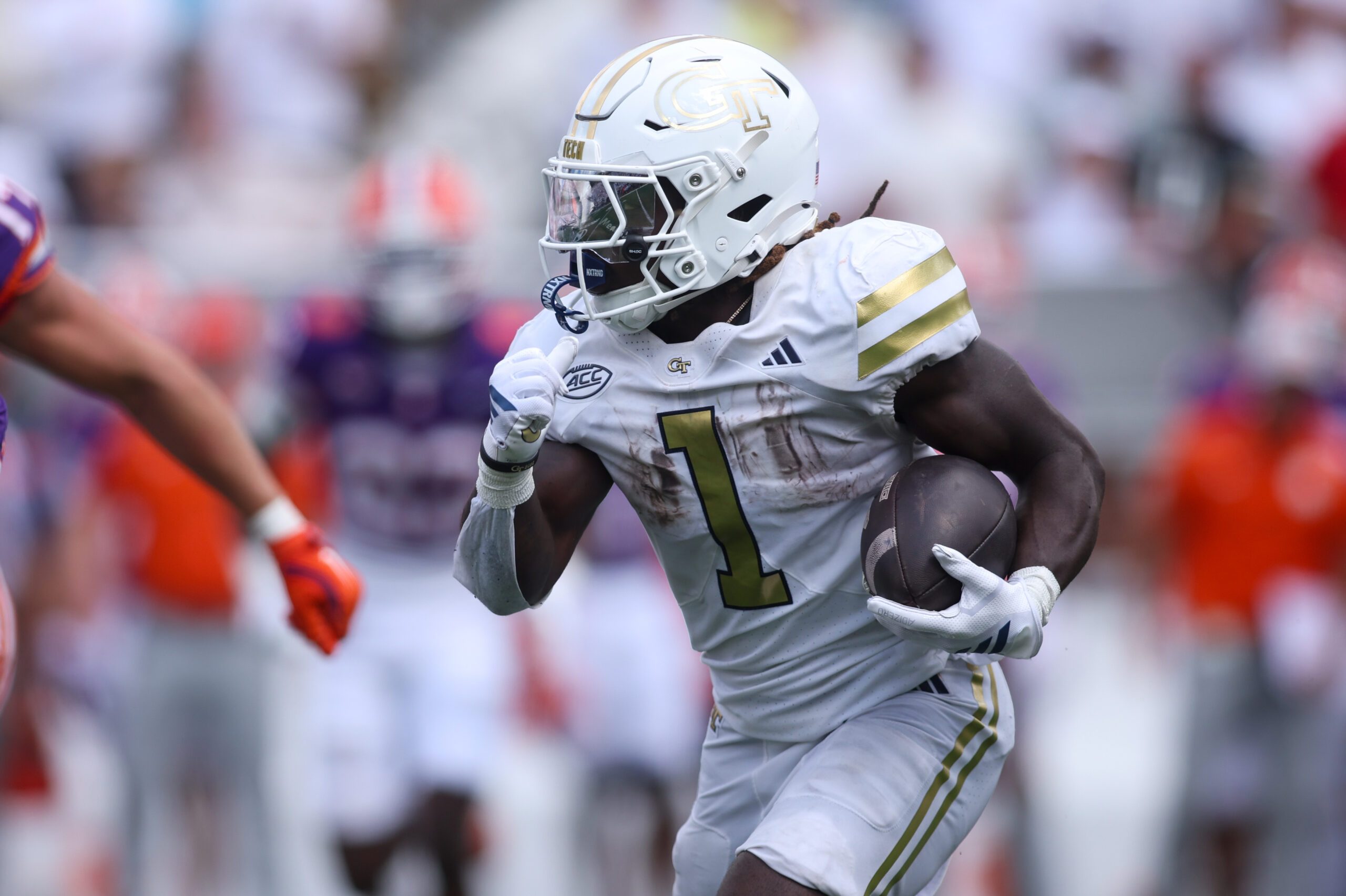 Sep 13, 2025; Atlanta, Georgia, USA; Georgia Tech Yellow Jackets running back Jamal Haynes (1) runs the ball against the Clemson Tigers in the third quarter at Bobby Dodd Stadium at Hyundai Field. Mandatory Credit: Brett Davis-Imagn Images