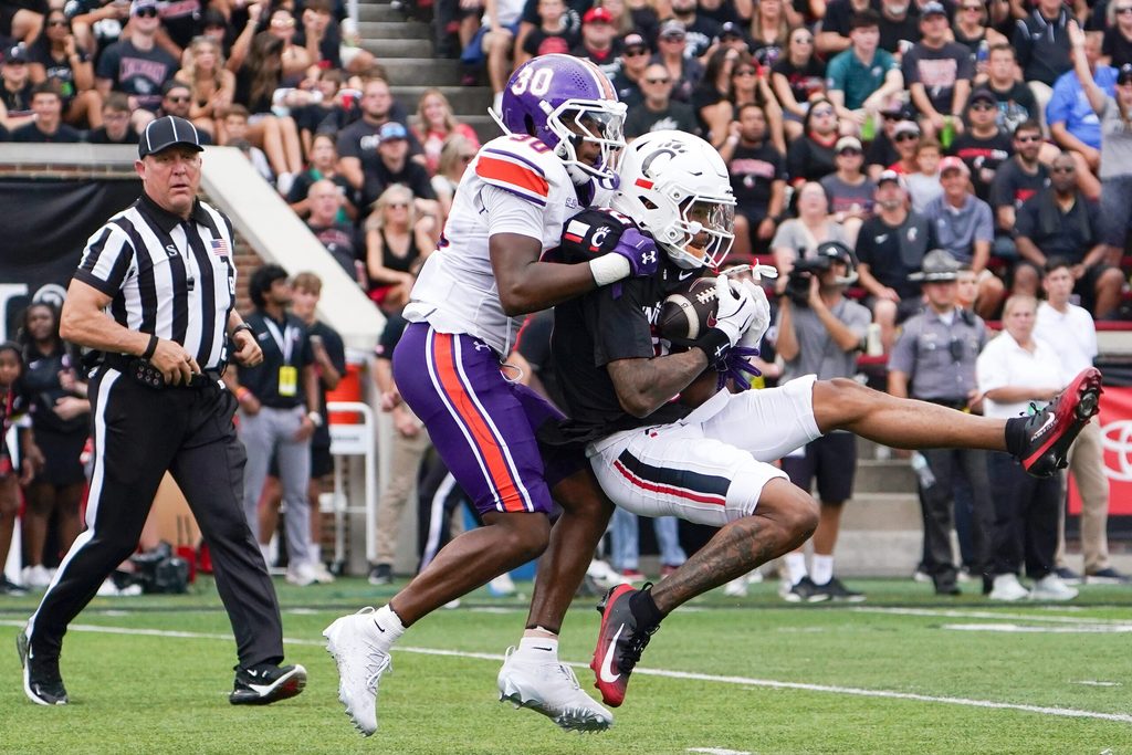 Cincinnati Bearcats wide receiver Caleb Goodie (10) completes a pass in the first quarter of a NCAA men’s college football game between the Cincinnati Bearcats and Northwestern State Demons, Saturday, Sept. 13, 2025, at Nippert Stadium in Cincinnati.