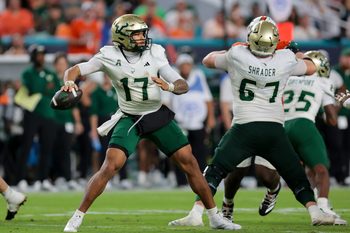 Sep 13, 2025; Miami Gardens, Florida, USA; South Florida Bulls quarterback Byrum Brown (17) passes the football against the Miami Hurricanes during the third quarter at Hard Rock Stadium. Mandatory Credit: Sam Navarro-Imagn Images