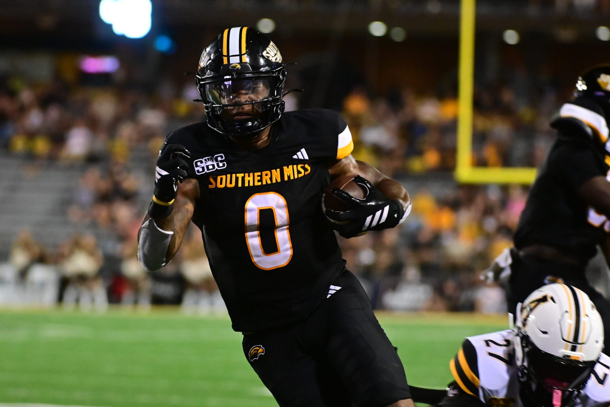 Southern Miss Golden Eagles running back Jeffery Pittman (0) runs for a touchdown against the Appalachian State Mountaineers during the fourth quarter at M.M. Roberts Stadium in Hattiesburg, Miss., on Sept. 13, 2025.