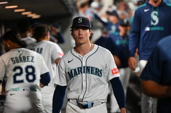 Sep 13, 2025; Seattle, Washington, USA; Seattle Mariners starting pitcher Bryan Woo (22) in the dugout during the sixth inning against the Los Angeles Angels at T-Mobile Park. Mandatory Credit: Steven Bisig-Imagn Images