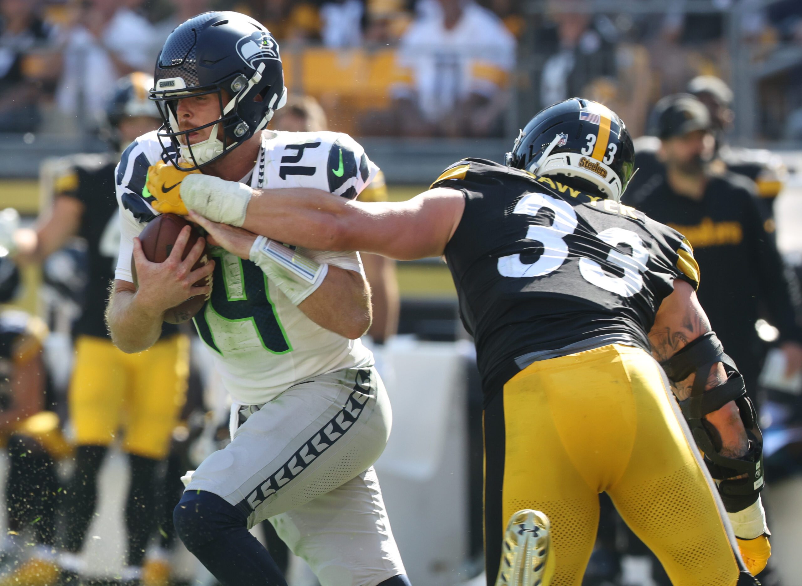 Sep 14, 2025; Pittsburgh, Pennsylvania, USA; Pittsburgh Steelers linebacker Jack Sawyer (33) sacks Seattle Seahawks quarterback Sam Darnold (14) during the fourth quarter at Acrisure Stadium. Mandatory Credit: Charles LeClaire-Imagn Images