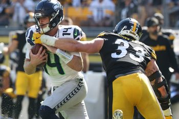 Sep 14, 2025; Pittsburgh, Pennsylvania, USA;  Pittsburgh Steelers linebacker Jack Sawyer (33) sacks Seattle Seahawks quarterback Sam Darnold (14) during the fourth quarter at Acrisure Stadium. Mandatory Credit: Charles LeClaire-Imagn Images