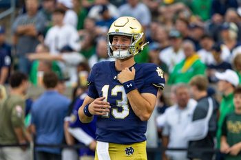Sep 13, 2025; South Bend, Indiana, USA; Notre Dame Fighting Irish quarterback CJ Carr (13) smiles during warmups before a game against the Texas A&M Aggies at Notre Dame Stadium. Mandatory Credit: Michael Caterina-Imagn Images