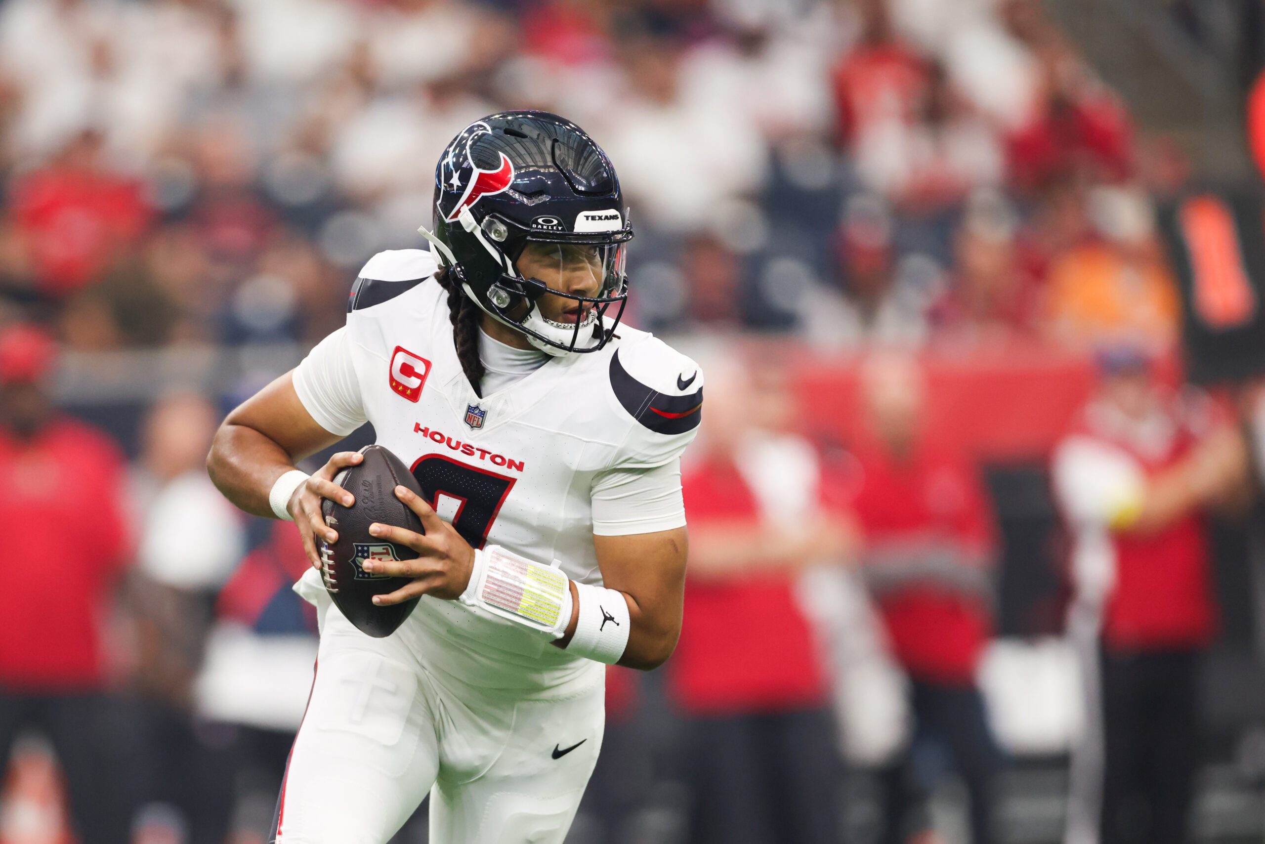 Sep 15, 2025; Houston, Texas, USA;  Houston Texans quarterback C.J. Stroud (7) drops back to pass during the first quarter against the Tampa Bay Buccaneers at NRG Stadium. Mandatory Credit: Troy Taormina-Imagn Images