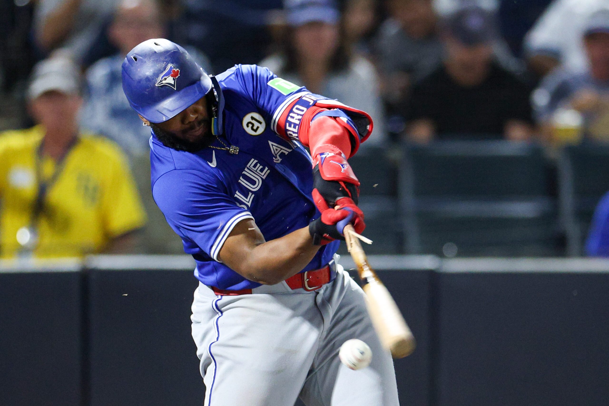 Sep 15, 2025; Tampa, Florida, USA; Toronto Blue Jays first base Vladimir Guerrero Jr. (21)  breaks his bat on a ground ball against the Tampa Bay Rays in the sixth inning at George M. Steinbrenner Field. Mandatory Credit: Nathan Ray Seebeck-Imagn Images