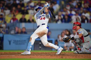 Sep 15, 2025; Los Angeles, California, USA; Los Angeles Dodgers center fielder Andy Pages (44) hits a solo home run against the Philadelphia Phillies during the ninth inning at Dodger Stadium. Mandatory Credit: Gary A. Vasquez-Imagn Images