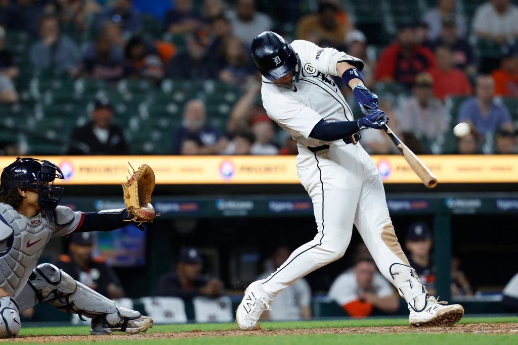 Sep 16, 2025; Detroit, Michigan, USA; Detroit Tigers first baseman Spencer Torkelson (20) hits a two-run home run in the tenth inning against the Cleveland Guardians t Comerica Park. Mandatory Credit: Rick Osentoski-Imagn Images