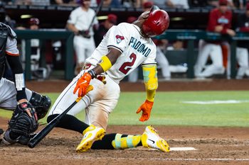 Sep 16, 2025; Phoenix, Arizona, USA; Arizona Diamondbacks batter Geraldo Perdomo reacts after being hit by a pitch in the eighth inning against the San Francisco Giants at Chase Field. Mandatory Credit: Mark J. Rebilas-Imagn Images