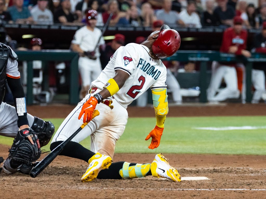Sep 16, 2025; Phoenix, Arizona, USA; Arizona Diamondbacks batter Geraldo Perdomo reacts after being hit by a pitch in the eighth inning against the San Francisco Giants at Chase Field. Mandatory Credit: Mark J. Rebilas-Imagn Images