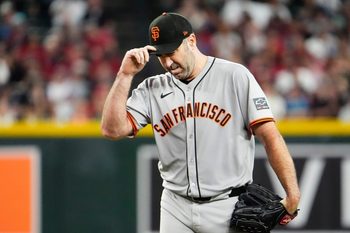 San Francisco Giants pitcher Justin Verlander (35) reacts after putting two Arizona Diamondbacks runners on first and second bases in the fourth inning at Chase Field in Phoenix on Sept. 17, 2025.