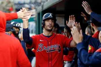 Sep 17, 2025; Washington, District of Columbia, USA; Atlanta Braves first baseman Matt Olson (28) celebrates with teammates in the dugout after scoring a run against the Washington Nationals during the ninth inning at Nationals Park. Mandatory Credit: Geoff Burke-Imagn Images