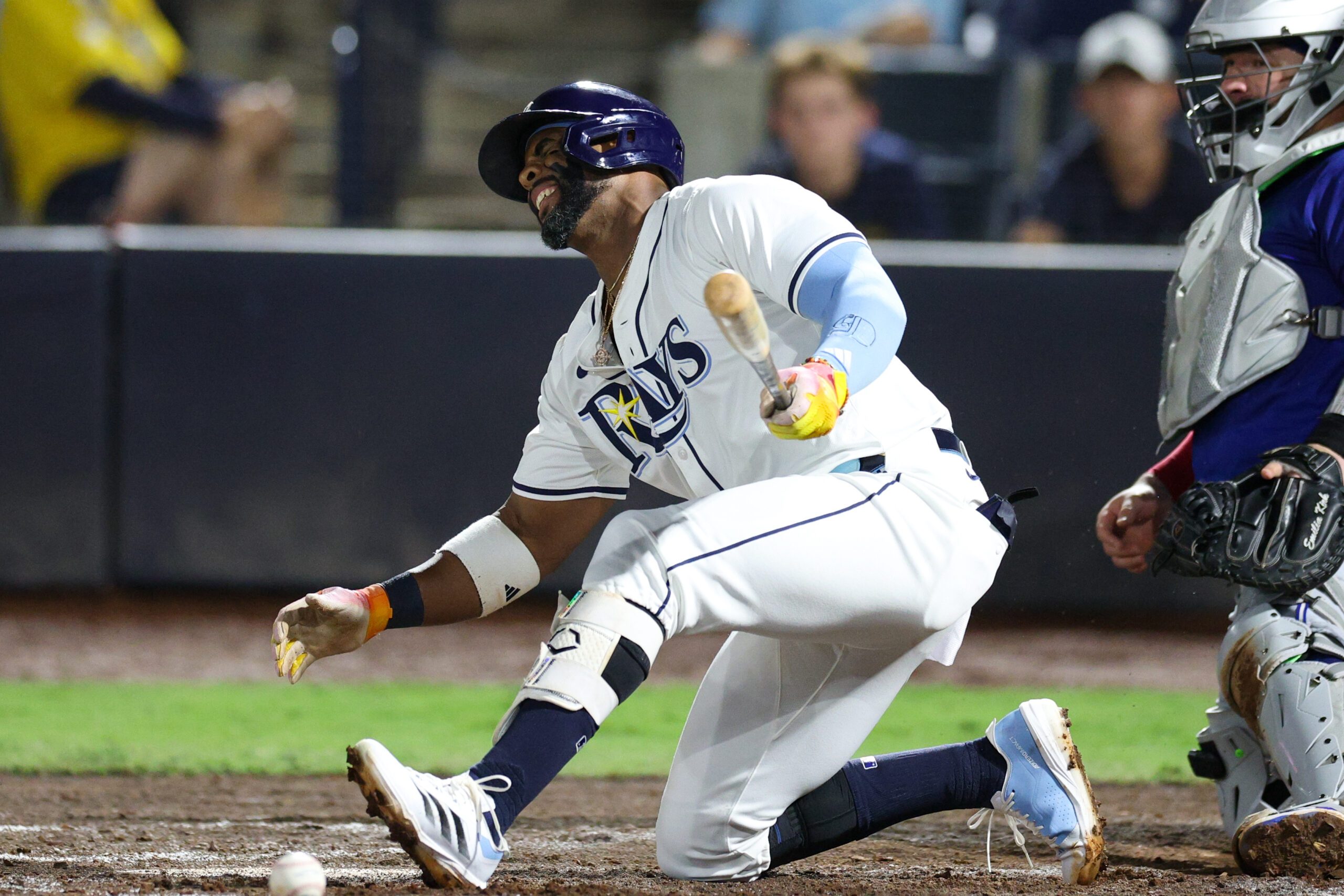 Sep 17, 2025; Tampa, Florida, USA; Tampa Bay Rays designated hitter Yandy Diaz (2) reacts after fouling a ball off his foot against the Toronto Blue Jays in the fifth inning at George M. Steinbrenner Field. Mandatory Credit: Nathan Ray Seebeck-Imagn Images