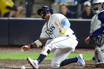 Sep 17, 2025; Tampa, Florida, USA; Tampa Bay Rays designated hitter Yandy Diaz (2) reacts after fouling a ball off his foot against the Toronto Blue Jays in the fifth inning at George M. Steinbrenner Field. Mandatory Credit: Nathan Ray Seebeck-Imagn Images
