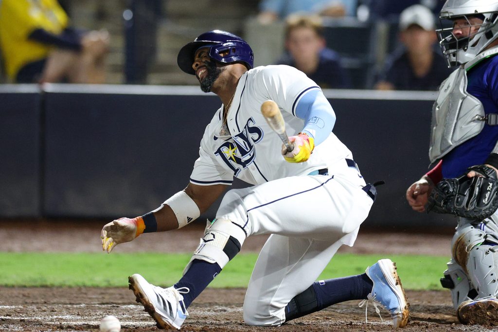 Sep 17, 2025; Tampa, Florida, USA; Tampa Bay Rays designated hitter Yandy Diaz (2) reacts after fouling a ball off his foot against the Toronto Blue Jays in the fifth inning at George M. Steinbrenner Field. Mandatory Credit: Nathan Ray Seebeck-Imagn Images