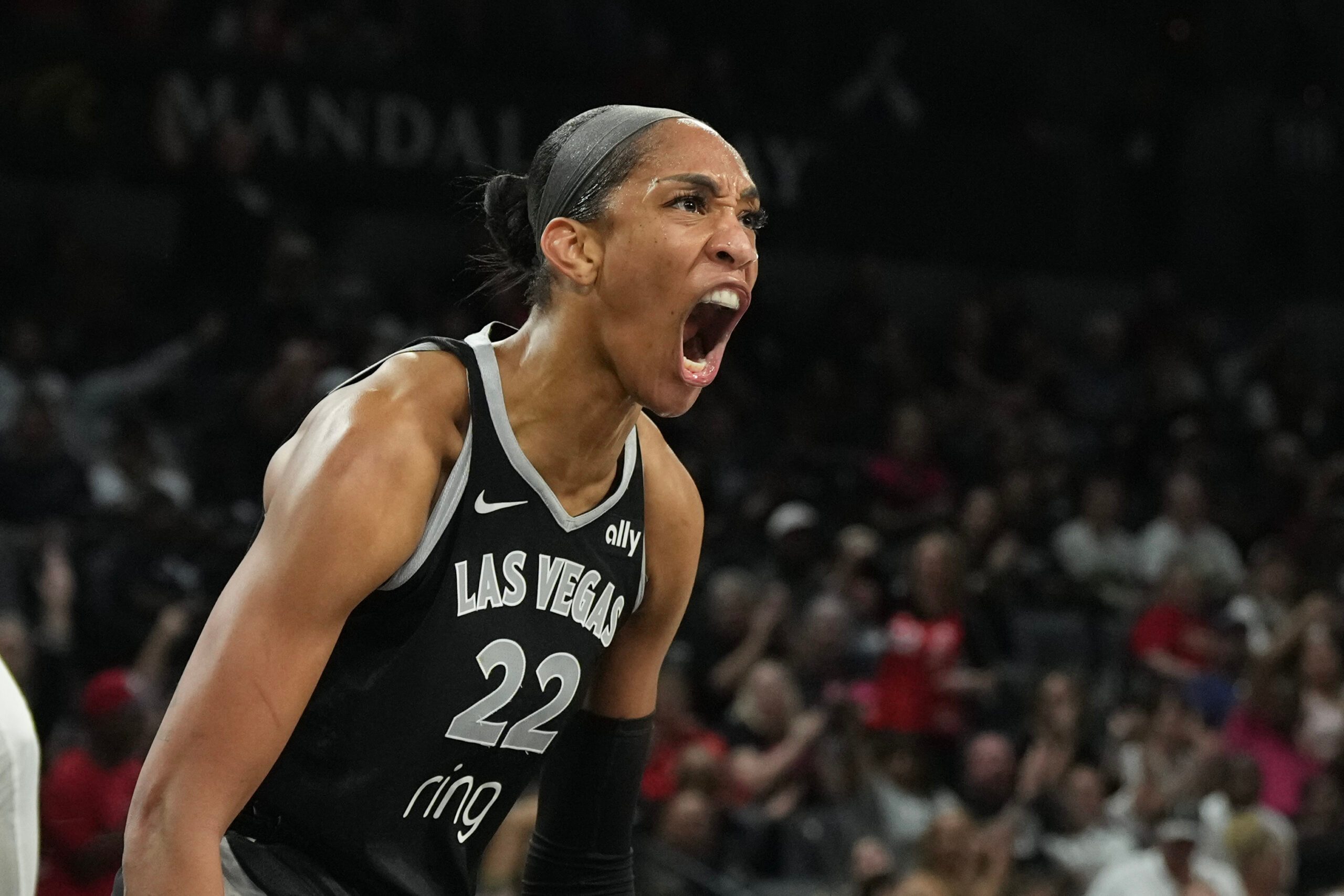 Sep 18, 2025; Las Vegas, Nevada, USA; Las Vegas Aces center A'ja Wilson (22) reacts to a play against the Seattle Storm in the third quarter during game three of round one for the 2025 WNBA Playoffs at Michelob Ultra Arena. Mandatory Credit: Candice Ward-Imagn Images