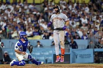 Sep 18, 2025; Los Angeles, California, USA;  San Francisco Giants shortstop Willy Adames (2) reacts after strike out looking during the seventh inning against the Los Angeles Dodgers at Dodger Stadium. Mandatory Credit: Kiyoshi Mio-Imagn Images