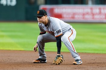 Sep 16, 2025; Phoenix, Arizona, USA; San Francisco Giants first baseman Wilmer Flores against the Arizona Diamondbacks at Chase Field. Mandatory Credit: Mark J. Rebilas-Imagn Images