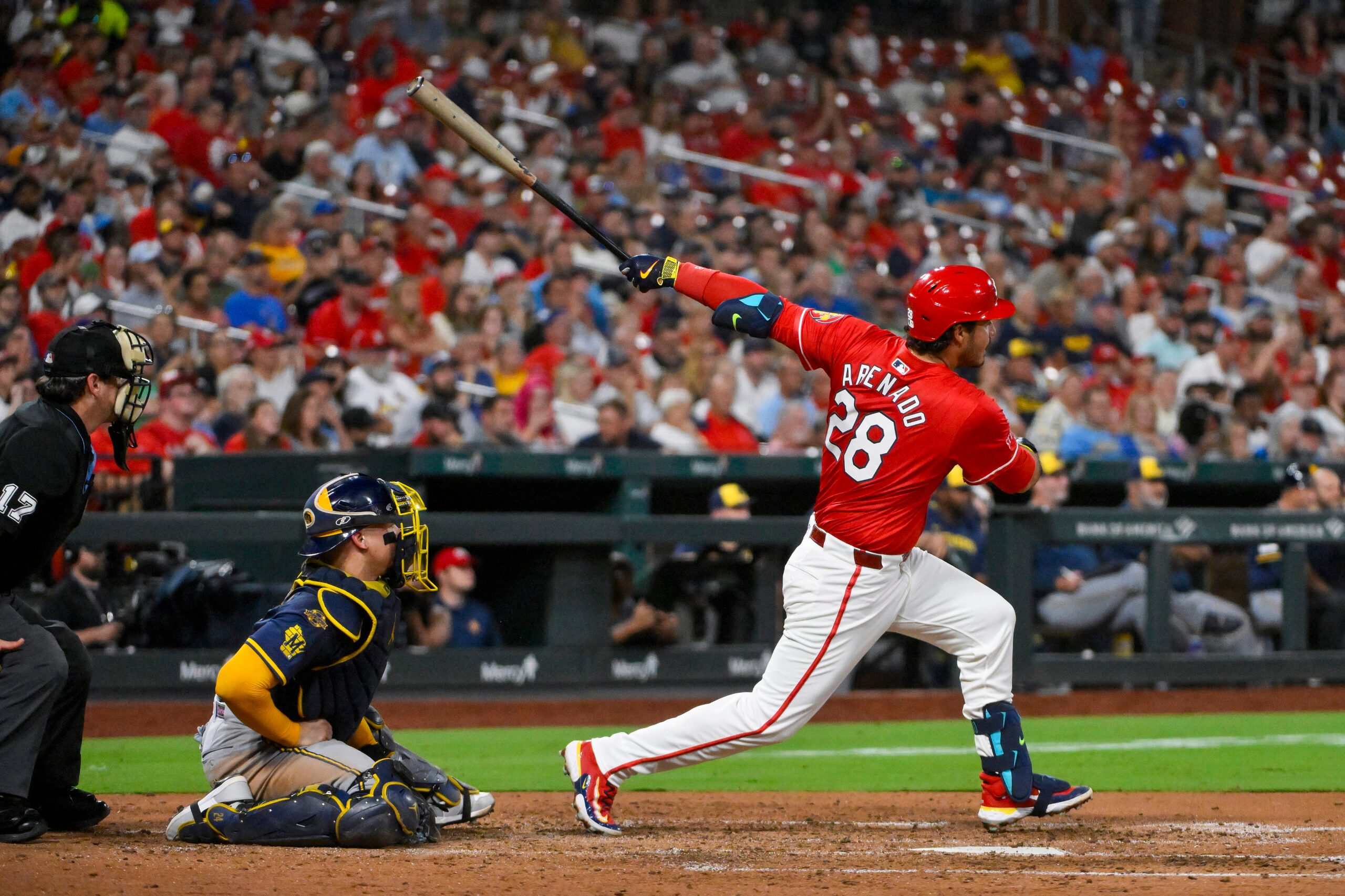 Sep 19, 2025; St. Louis, Missouri, USA;  St. Louis Cardinals third baseman Nolan Arenado (28) hits a three run double against the Milwaukee Brewers during the fifth inning at Busch Stadium. Mandatory Credit: Jeff Curry-Imagn Images