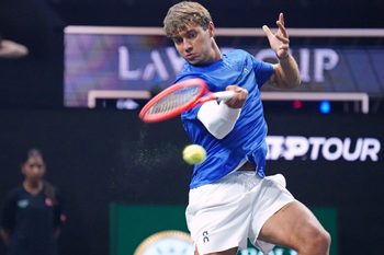 Sep 19, 2025; San Francisco, CA, USA; Team Europe player Flavio Cobolli hits a forehand against Team World player Joao Fonseca during match three of the Laver Cup at Chase Center. Mandatory Credit: David Gonzales-Imagn Images