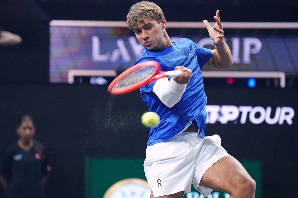 Sep 19, 2025; San Francisco, CA, USA; Team Europe player Flavio Cobolli hits a forehand against Team World player Joao Fonseca during match three of the Laver Cup at Chase Center. Mandatory Credit: David Gonzales-Imagn Images