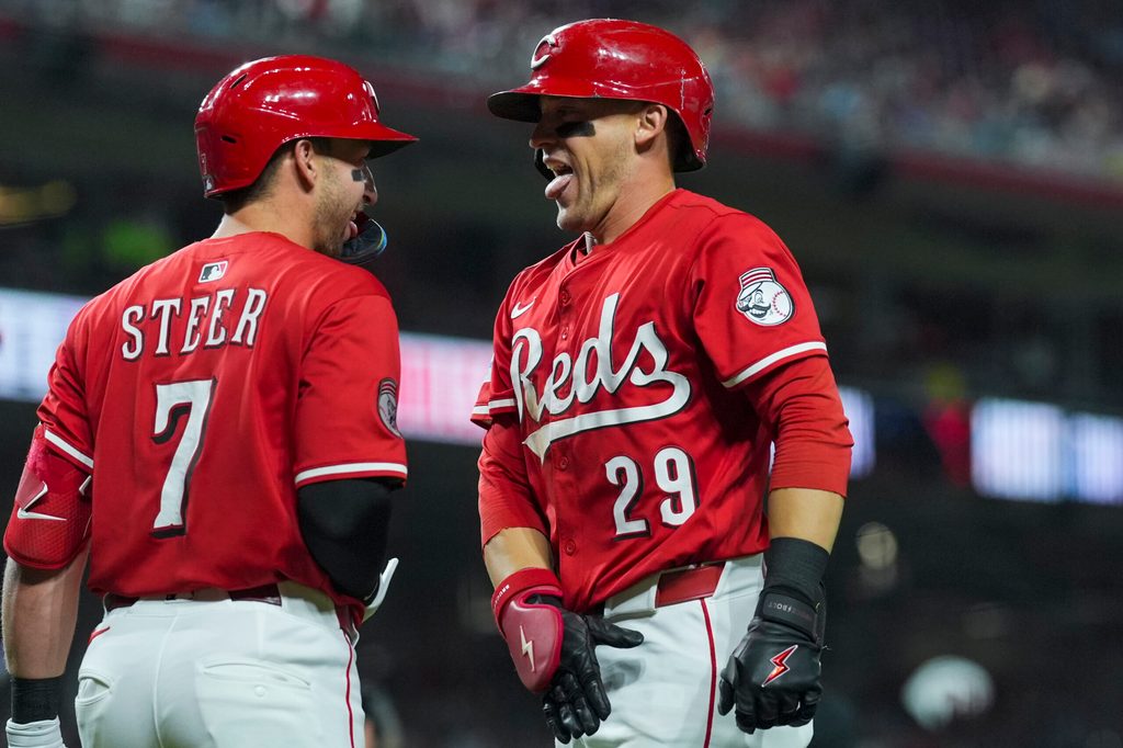 Sep 20, 2025; Cincinnati, Ohio, USA; Cincinnati Reds outfielder TJ Friedl (29) celebrates with first baseman Spencer Steer (7) after hitting a solo home run against the Chicago Cubs in the seventh inning at Great American Ball Park. Mandatory Credit: Aaron Doster-Imagn Images