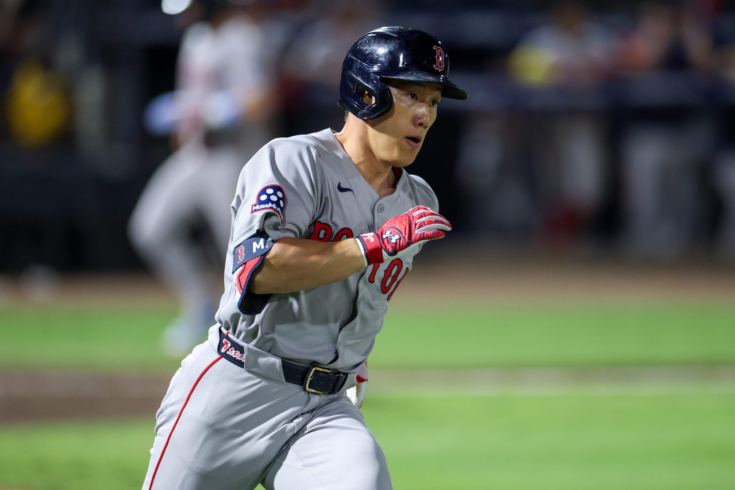 Sep 20, 2025; Tampa, Florida, USA; Boston Red Sox designated hitter Masataka Yoshida (7) runs to first after hitting an rbi single against the Tampa Bay Rays in the ninth inning at George M. Steinbrenner Field. Mandatory Credit: Nathan Ray Seebeck-Imagn Images
