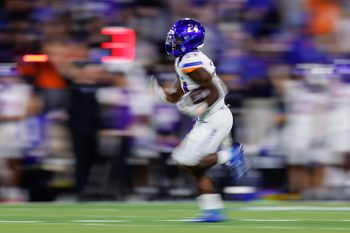 Sep 20, 2025; Colorado Springs, Colorado, USA; Boise State Broncos running back Dylan Riley (24) runs the ball for a touchdown in the fourth quarter against the Air Force Falcons at Falcon Stadium. Mandatory Credit: Isaiah J. Downing-Imagn Images
