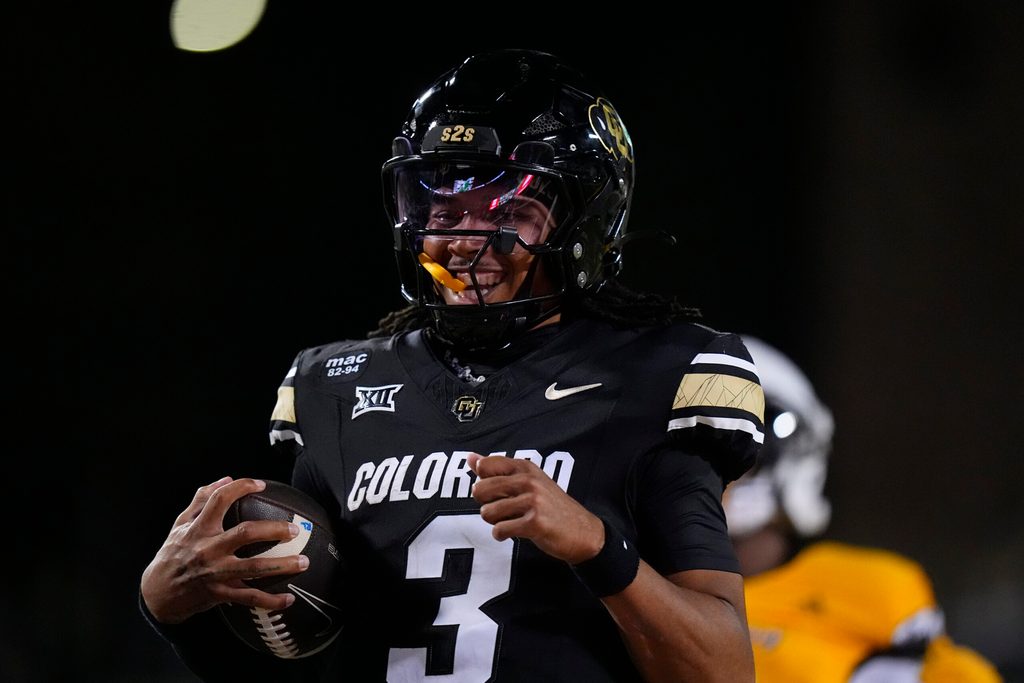 Sep 20, 2025; Boulder, Colorado, USA; Colorado Buffaloes quarterback Kaidon Salter (3) reacts as he scores a rushing touchdown in the fourth quarter at against the Wyoming Cowboys Folsom Field. Mandatory Credit: Ron Chenoy-Imagn Images