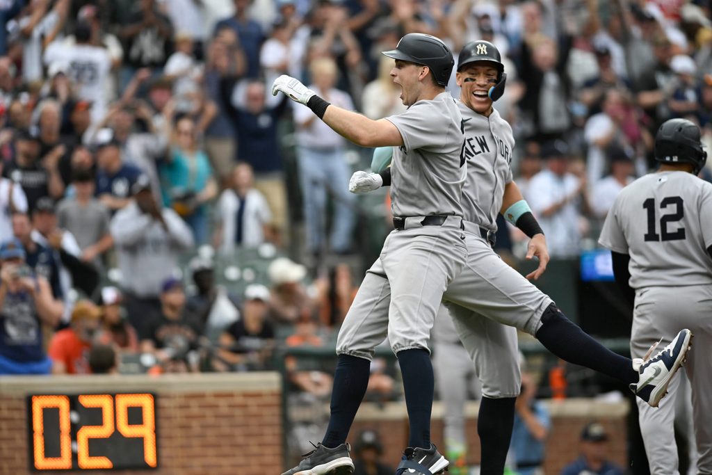 Sep 21, 2025; Baltimore, Maryland, USA; New York Yankees first base Ben Rice (22) celebrates with designated hitter Aaron Judge (99) at home plate after hitting a tenth inning grand slam against the Baltimore Orioles at Oriole Park at Camden Yards. Mandatory Credit: Tommy Gilligan-Imagn Images