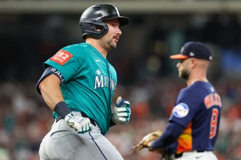 Sep 21, 2025; Houston, Texas, USA; Seattle Mariners catcher Cal Raleigh (29) rounds the bases after hitting a two-run home run against the Houston Astros in the second inning at Daikin Park. Mandatory Credit: Thomas Shea-Imagn Images