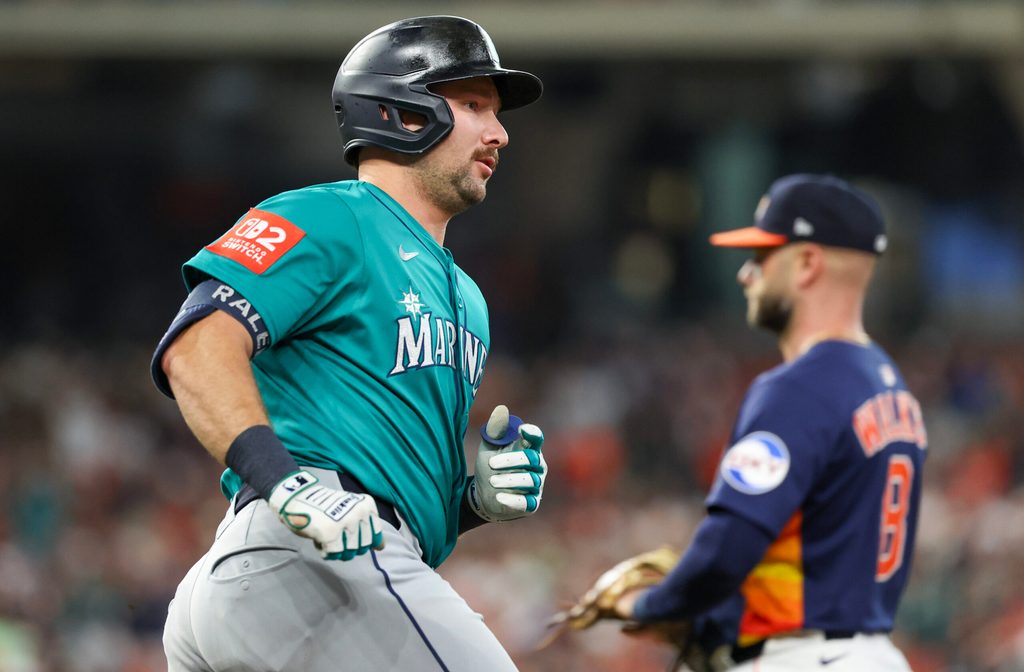 Sep 21, 2025; Houston, Texas, USA; Seattle Mariners catcher Cal Raleigh (29) rounds the bases after hitting a two-run home run against the Houston Astros in the second inning at Daikin Park. Mandatory Credit: Thomas Shea-Imagn Images