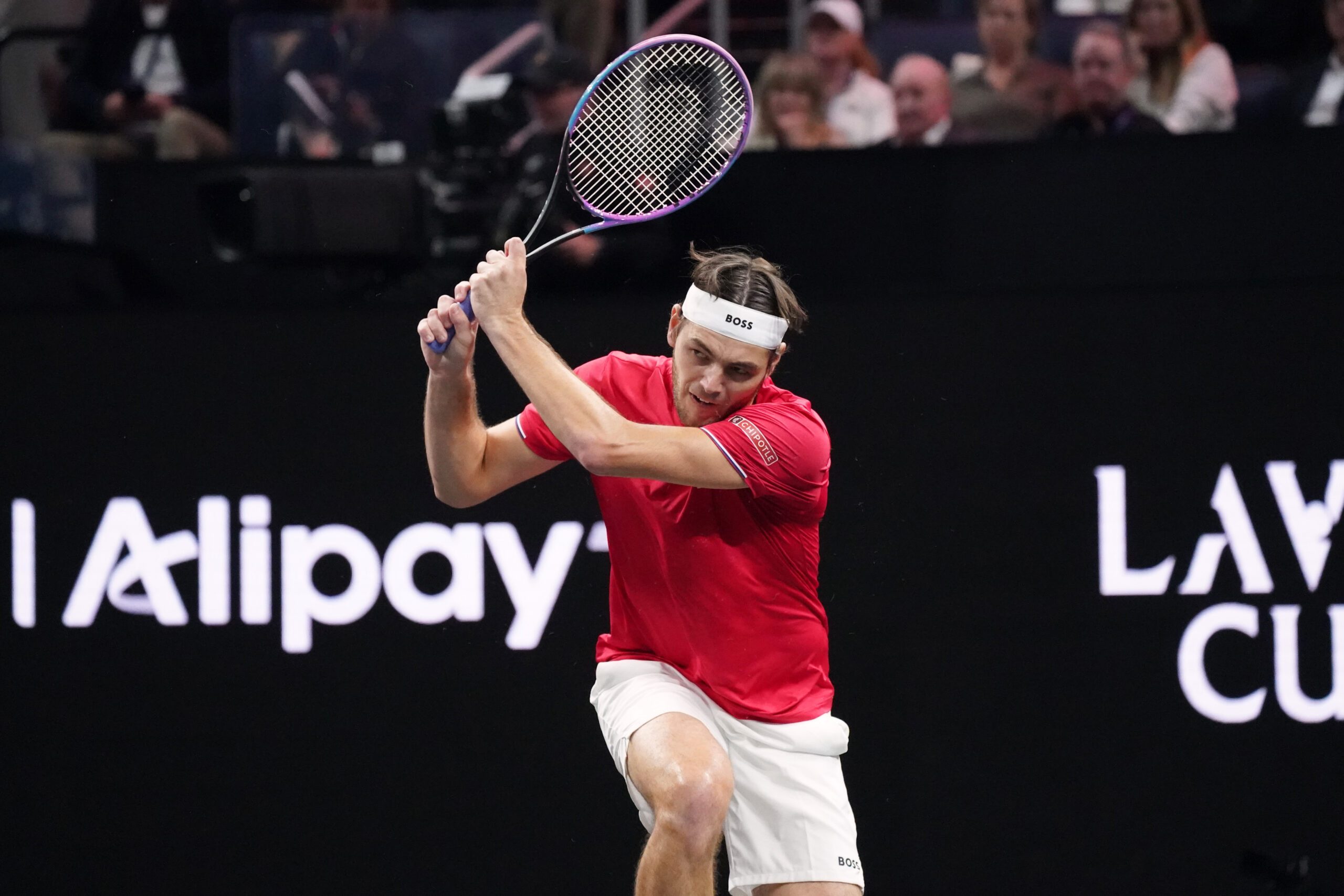 Sep 21, 2025; San Francisco, CA, USA;  Team World player Taylor Fritz returns the ball from Team Europe player Alexander Zverev during the Laver Cup at Chase Center. Mandatory Credit: David Gonzales-Imagn Images